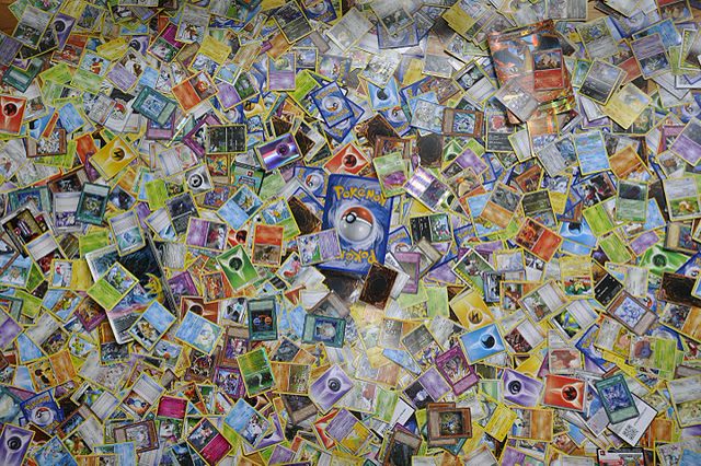 Large loose Pokémon card collection spread